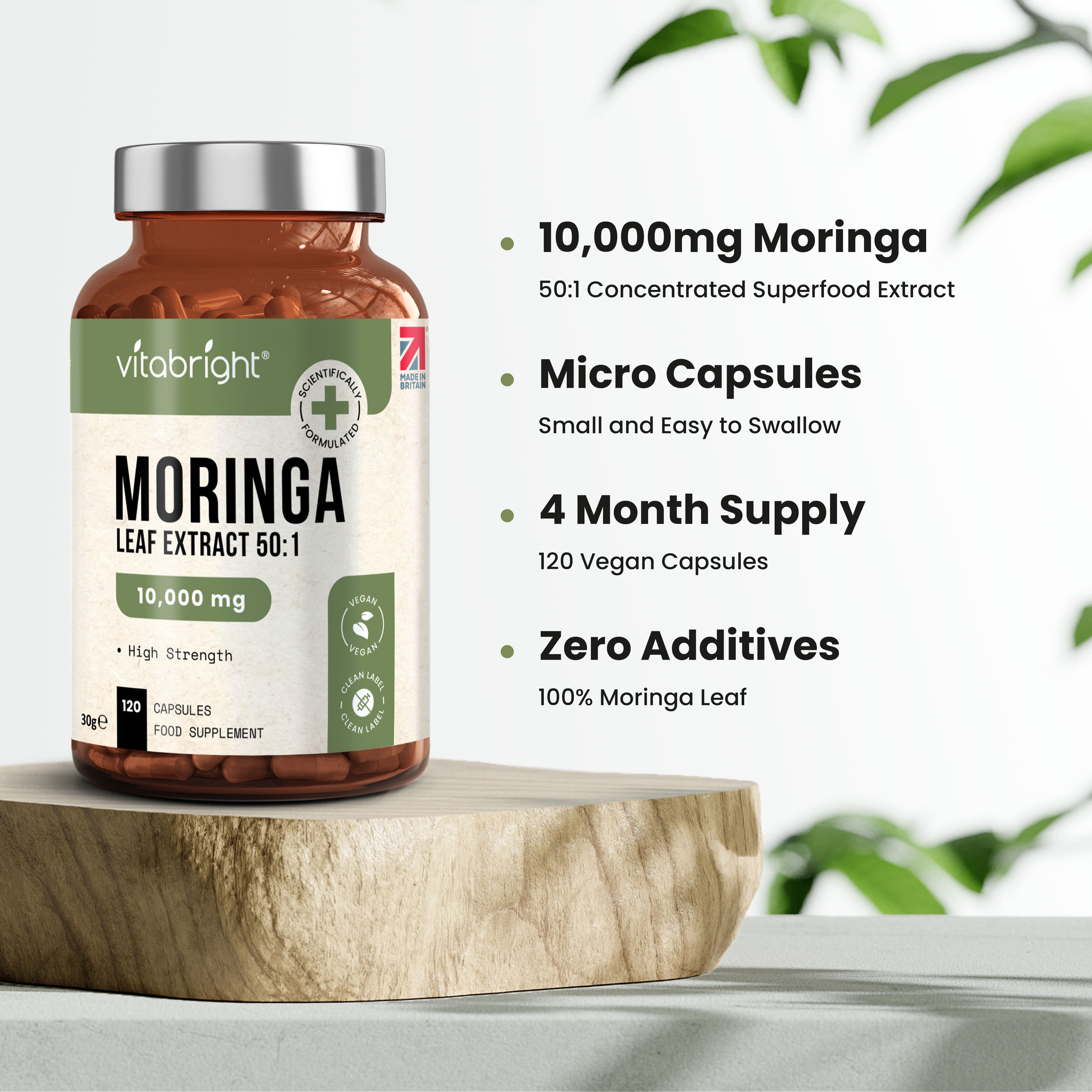 Vitabright Moringa supplement bottle on a wooden block with product details_en